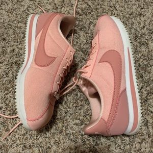 Baby pink Nike Cortez